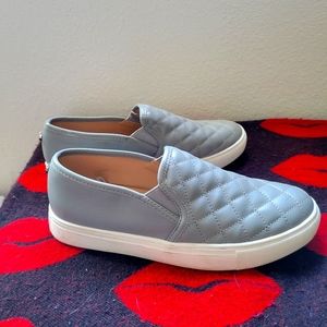 Womans gray slip ons
